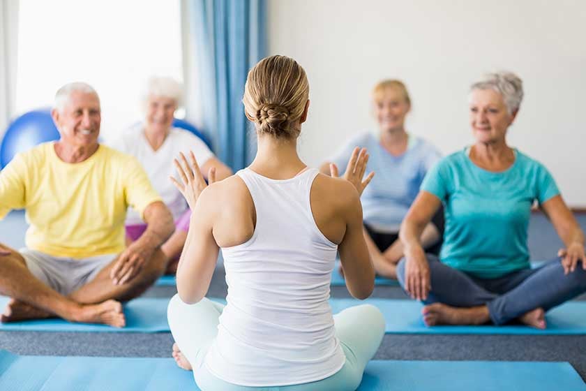 instructor-performing-yoga-with-seniors (1)